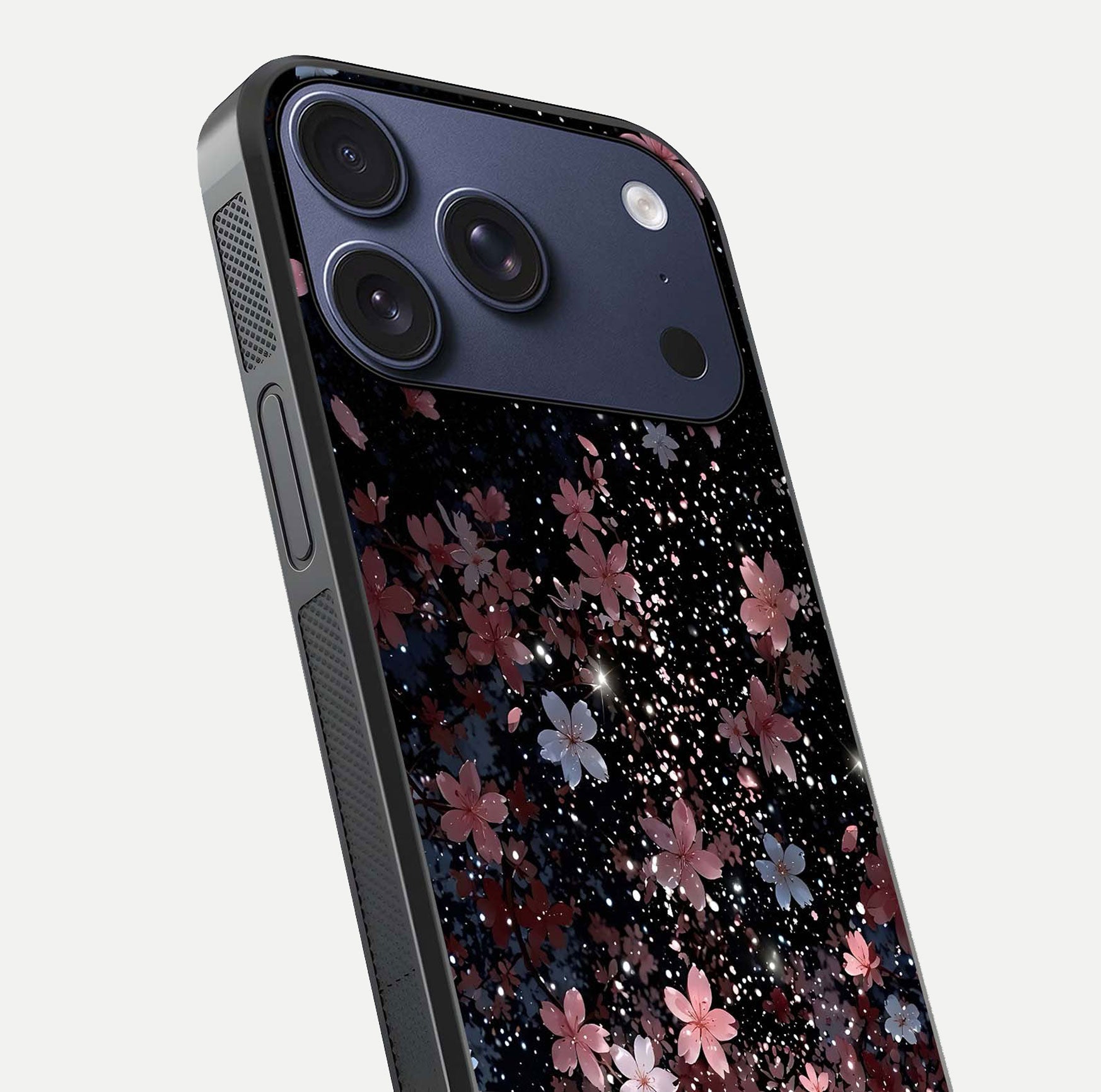 Starlit Flower Dreams Glass Case for iPhone 17 Pro close-up angled shot highlighting petal reflection and HD depth