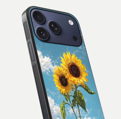 Sunflower Sky Bloom Glass Case for iPhone 17 Pro close-up angled shot highlighting petal details and reflection