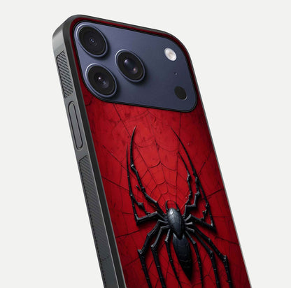 Venom Web Emblem Glass Case for iPhone 17 Pro close-up angled shot highlighting sharp logo lines and reflection
