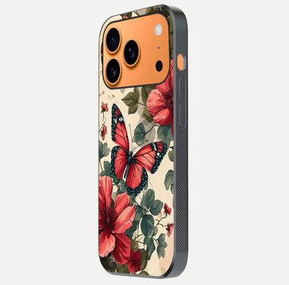 Crimson Butterfly Garden Glass Case for iPhone 17 Pro Max side-angle photo capturing gloss texture and soft tone