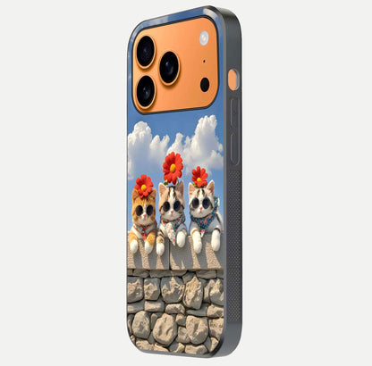 Floral Kitty Squad Glass Case for iPhone 17 Pro Max side-angle photo showing reflection glow and polished surface