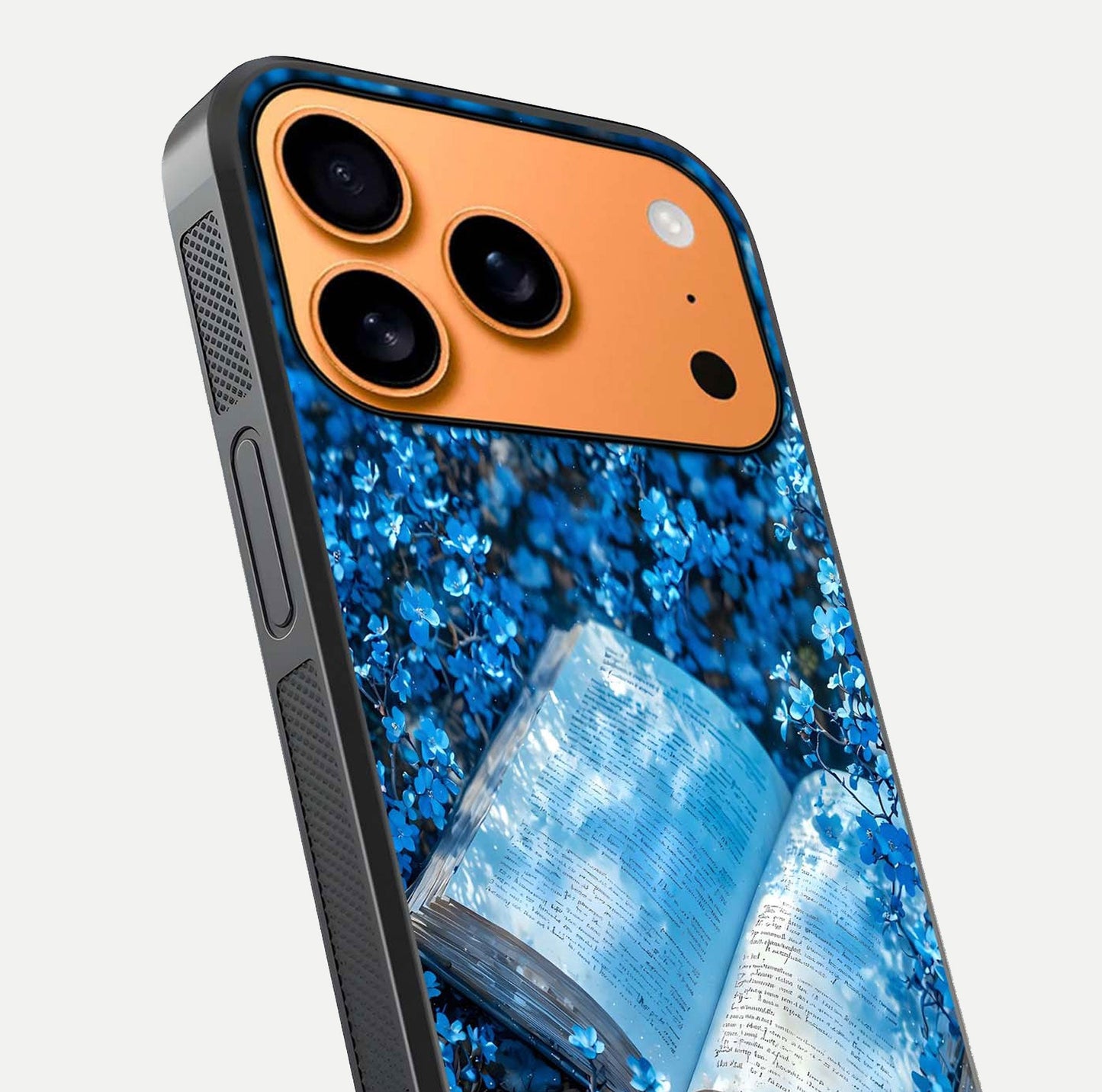 Blue Bloom Tales Glass Case for iPhone 17 Pro Max close-up angle showing petal texture and blue tone reflection