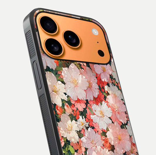 Blush Bloom Field Glass Case for iPhone 17 Pro Max close-up shot capturing pastel flower field tones and gloss shine