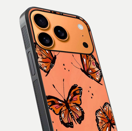 Coral Wing Butterfly Glass Case for iPhone 17 Pro Max close-up highlighting wing pattern, coral tones, and reflection shine