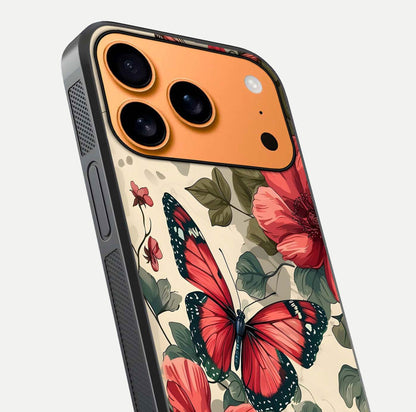 Crimson Butterfly Garden Glass Case for iPhone 17 Pro Max close-up showing wing detail and reflection shine