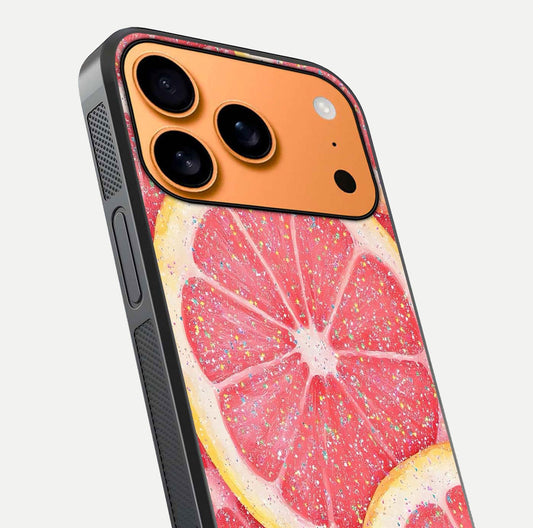 Glitter Grapefruit Glass Case for iPhone 17 Pro Max close-up angled shot showing fruit texture and glitter reflection