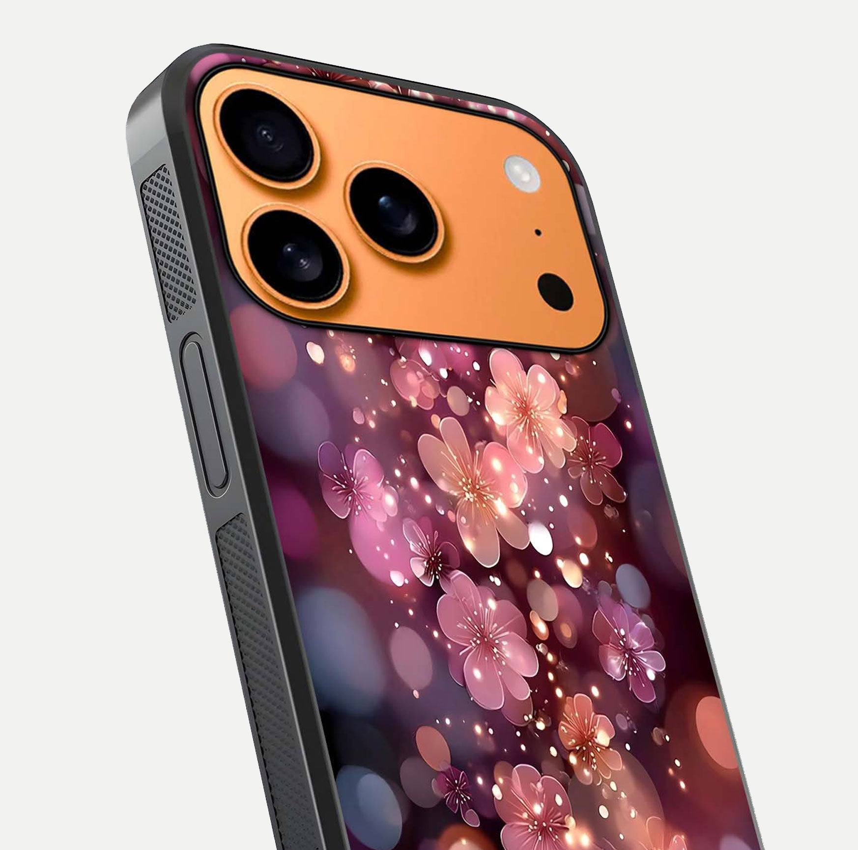 Glowing Petal Bliss Glass Case for iPhone 17 Pro Max close-up angled shot showing petal glow, color depth, and reflection shine