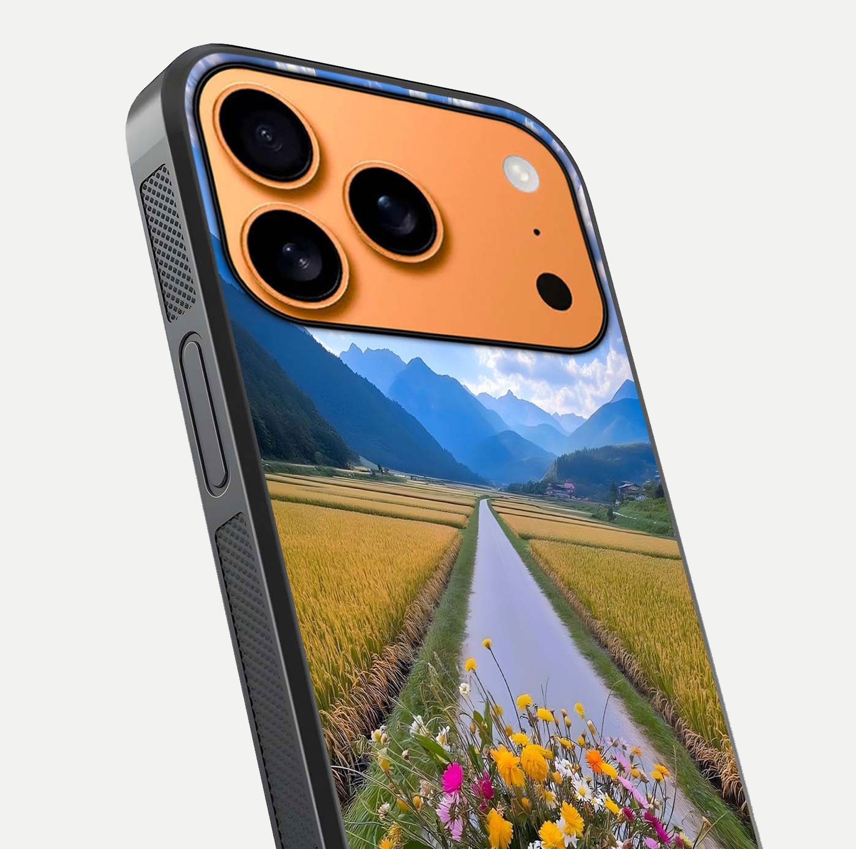Golden Field Journey Glass Case for iPhone 17 Pro Max close-up angled shot showing sunlight tones and reflection clarity