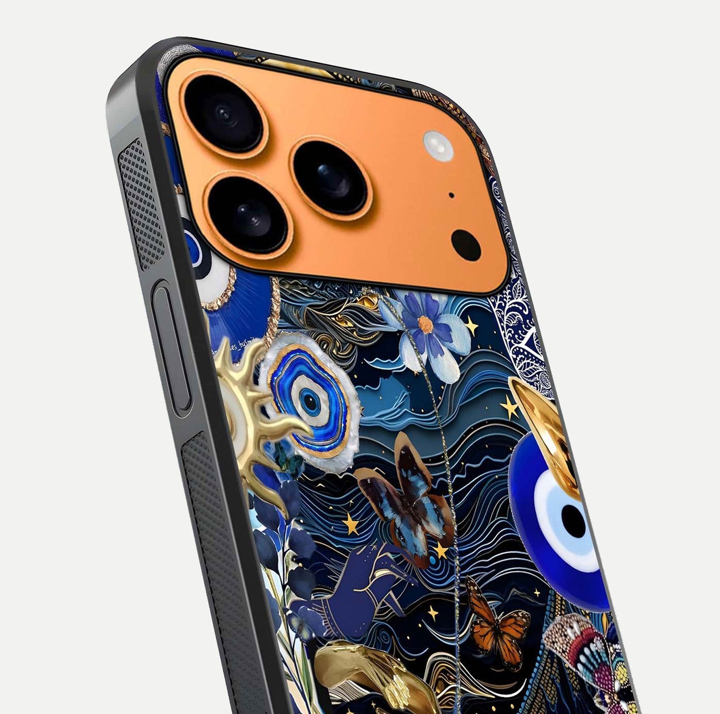 Golden Moon Magic Glass Case for iPhone 17 Pro Max close-up angled shot showing lunar glow, star detail, and reflection brightness
