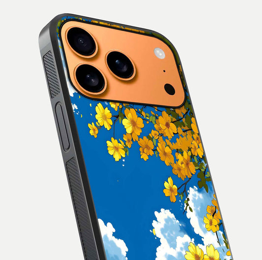Golden Petal Sky Glass Case for iPhone 17 Pro Max close-up angled shot showing petal texture and shine reflection