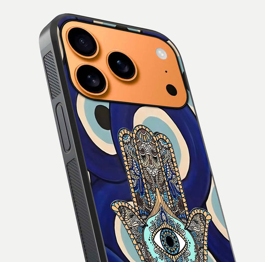 Hamsa Divine Guard Glass Case for iPhone 17 Pro Max close-up angled shot showing detailed palm motif and reflection glow