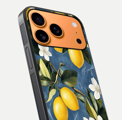 Lemon Dream Garden Glass Case for iPhone 17 Pro Max close-up angled shot showing fruit details and shine reflection