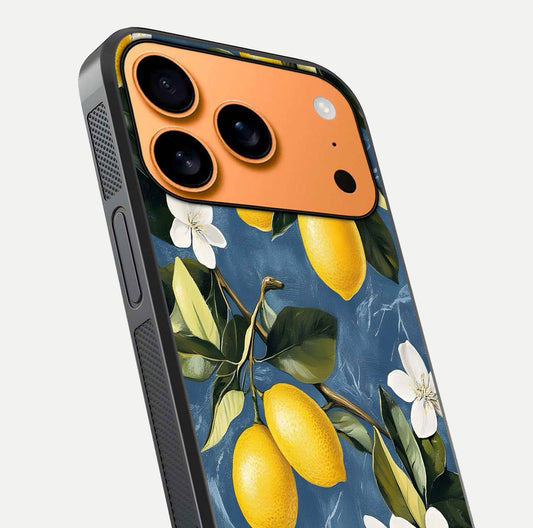 Lemon Dream Garden Glass Case for iPhone 17 Pro Max close-up angled shot showing fruit details and shine reflection