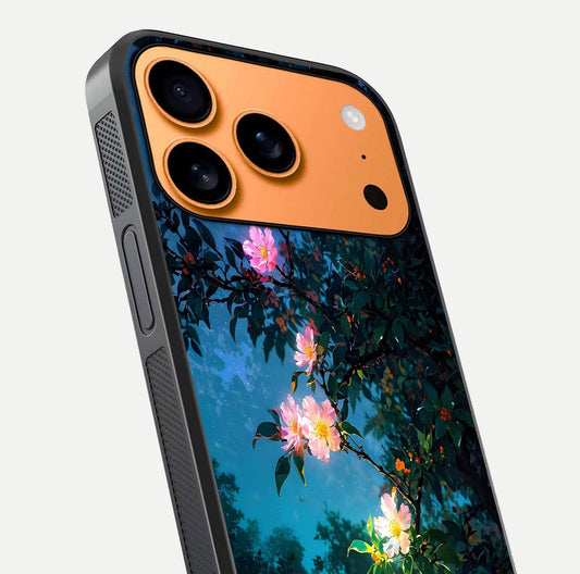 Midnight Bloom Glow Glass Case for iPhone 17 Pro Max close-up angled shot showing petal highlights and glow reflection
