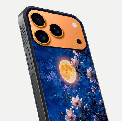 Moonlit Blossoms Night Glass Case for iPhone 17 Pro Max close-up angled shot showing petal glow and reflection detail