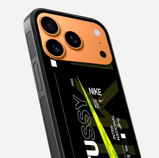 Neon Street Edition Glass Case for iPhone 17 Pro Max close-up angled shot showing urban neon lights and shine