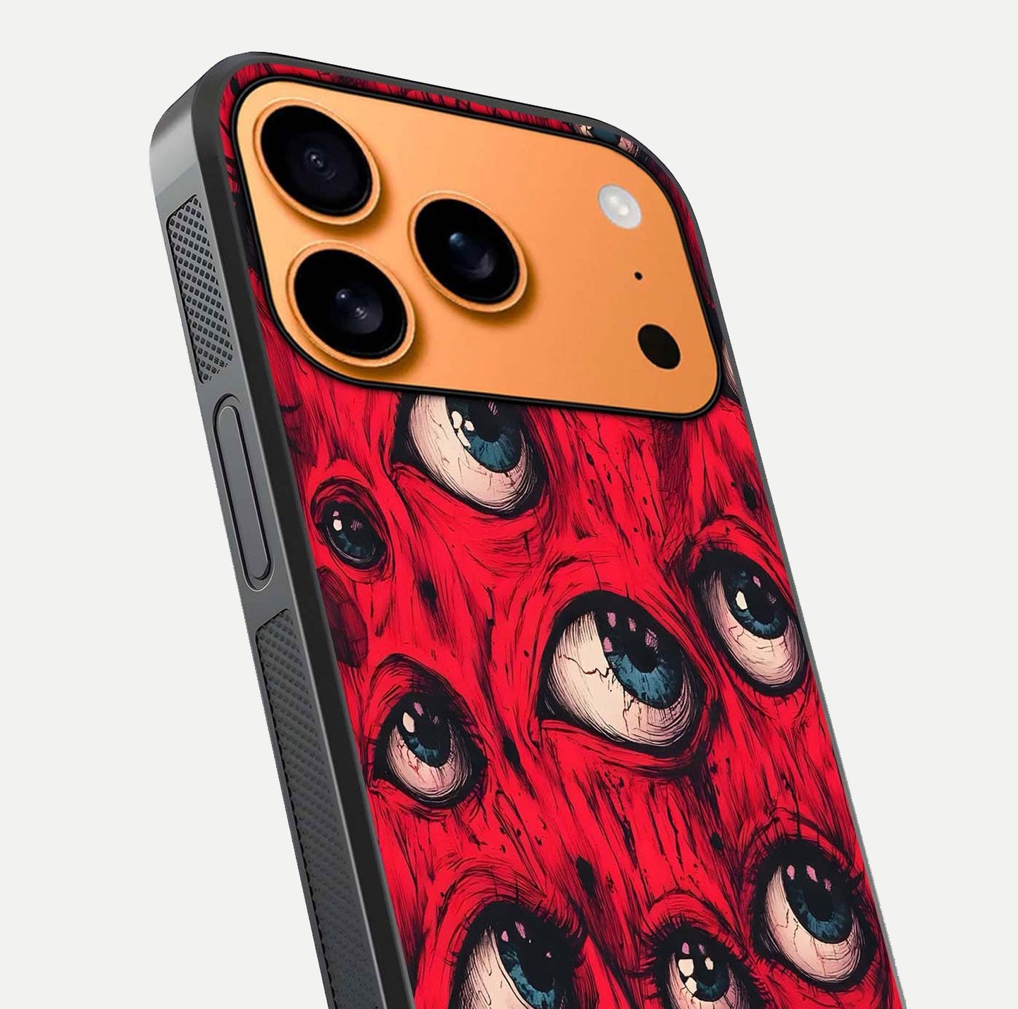 Red Eyes Pattern Glass Case for iPhone 17 Pro Max close-up angled shot highlighting vivid contrast and HD shine