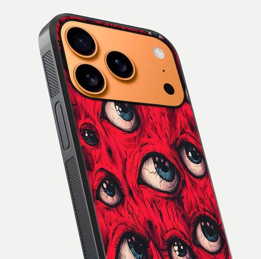 Red Eyes Pattern Glass Case for iPhone 17 Pro Max close-up angled shot highlighting vivid contrast and HD shine