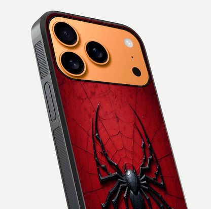 Venom Web Emblem Glass Case for iPhone 17 Pro Max close-up angled shot highlighting sharp logo lines and reflection