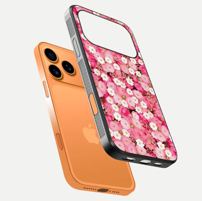 Pink Daisy Bliss Glass Case for iPhone 17 Pro Max floating dual-view mockup displaying gloss shine and pastel tones