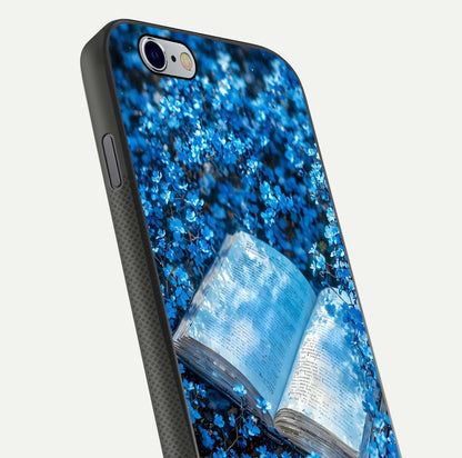 Blue Bloom Tales Glass Case for iPhone 16 Pro close-up angle showing petal texture and blue tone reflection