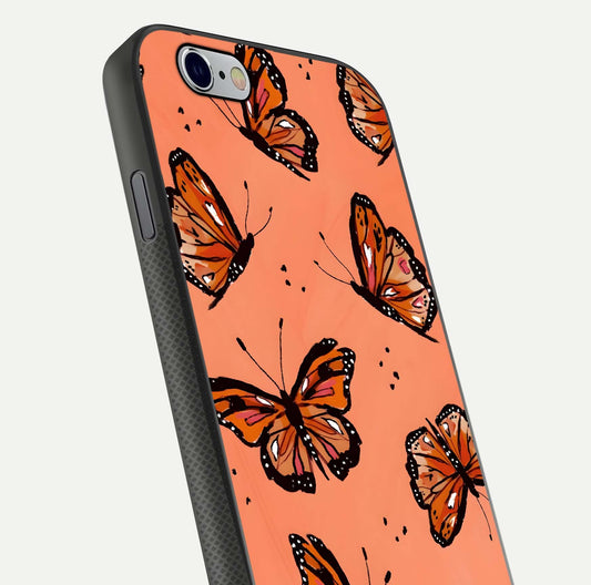 Coral Wing Butterfly Glass Case for iPhone 16 Pro close-up highlighting wing pattern, coral tones, and reflection shine