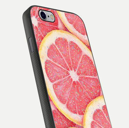 Glitter Grapefruit Glass Case for iPhone 16 Pro close-up angled shot showing fruit texture and glitter reflection
