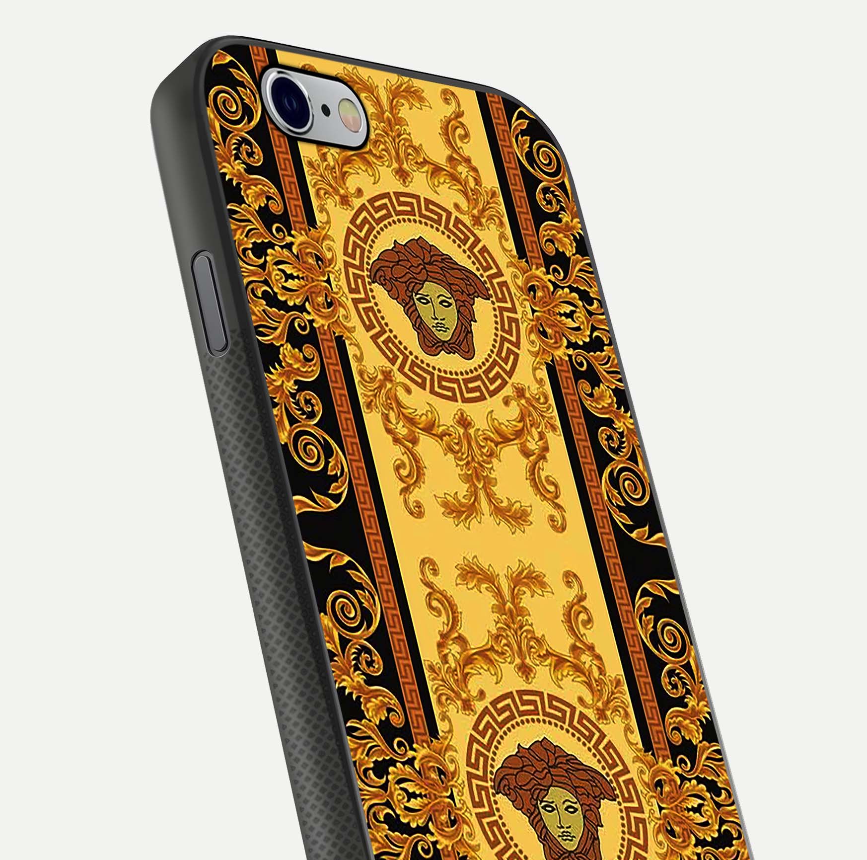 Golden Royal Heritage Glass Case for iPhone 16 Pro close-up angled shot showing intricate design and metallic reflection