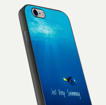 Just Keep Swimming Glass Case for iPhone 16 Pro close-up angled shot showing elegant lettering and blue tone reflection