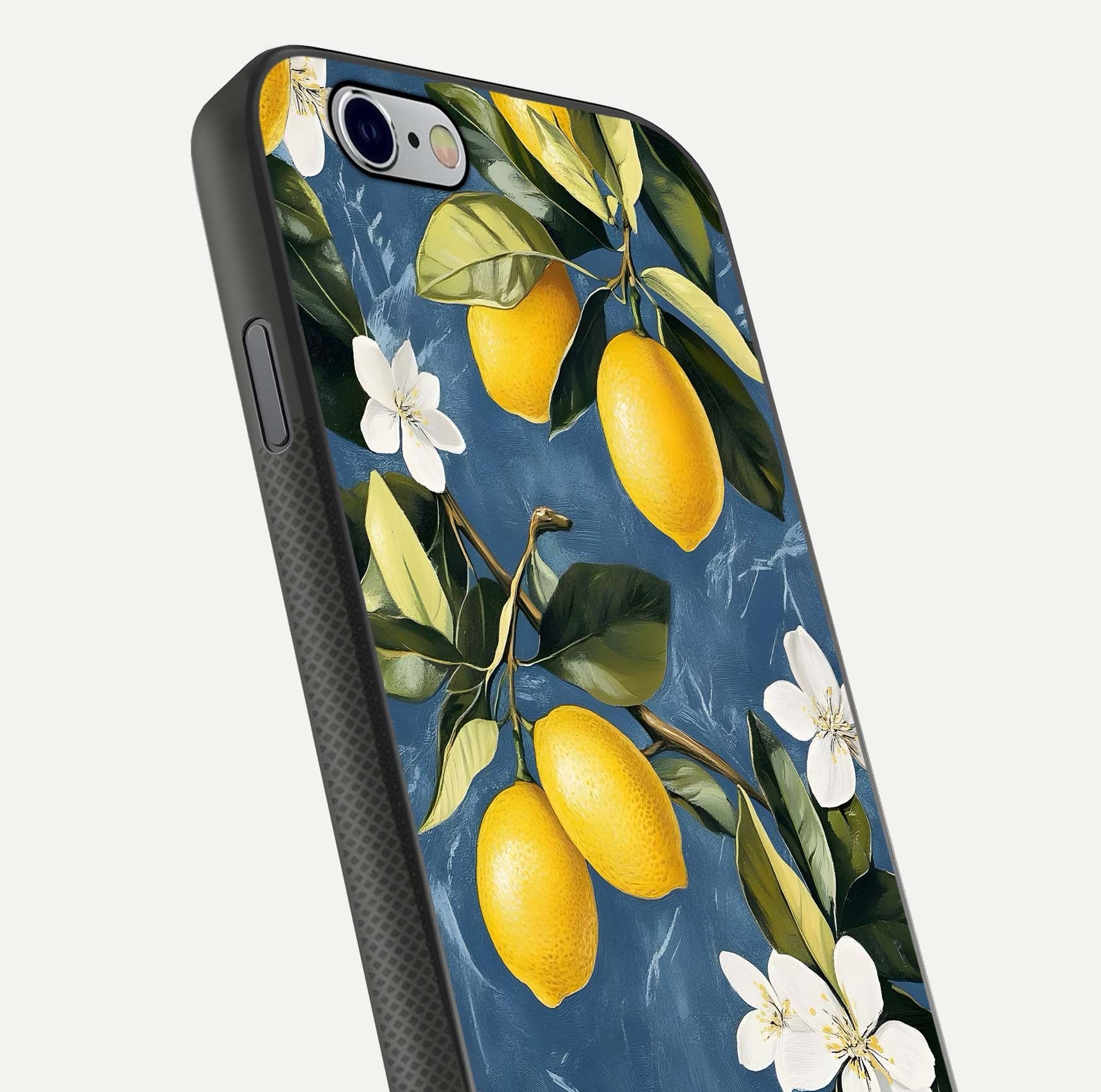 Lemon Dream Garden Glass Case for iPhone 16 Pro close-up angled shot showing fruit details and shine reflection