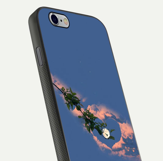 Sky Under Tree Glass Case for iPhone 16 Pro close-up angled shot highlighting detail, color, and reflection