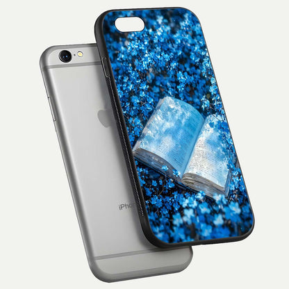 Blue Bloom Tales Glass Case for iPhone 16 Pro floating mockup showing detailed bloom and reflective surface