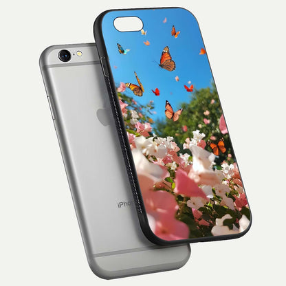 Butterflies in Bloom Sky Glass Case for iPhone 16 Pro floating mockup capturing butterfly motion and edge design