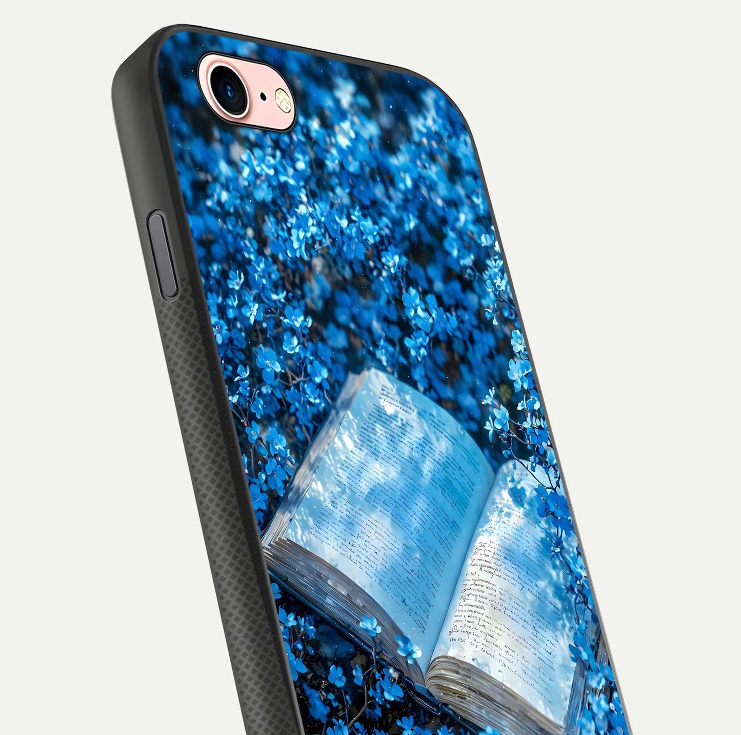 Blue Bloom Tales Glass Case for iPhone 16 Pro close-up angle showing petal texture and blue tone reflection