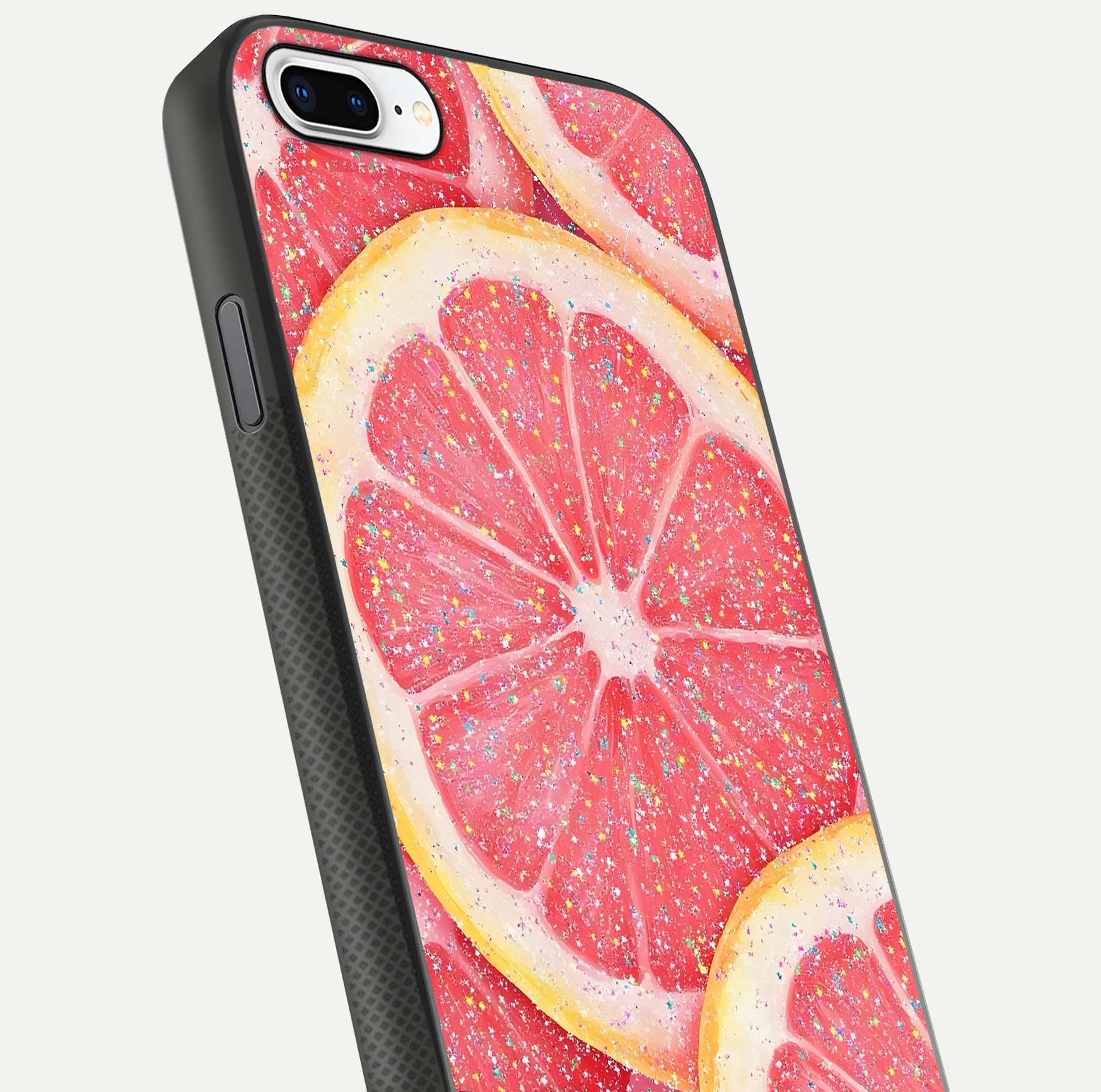 Glitter Grapefruit Glass Case for iPhone 8 Plus close-up angled shot showing fruit texture and glitter reflection