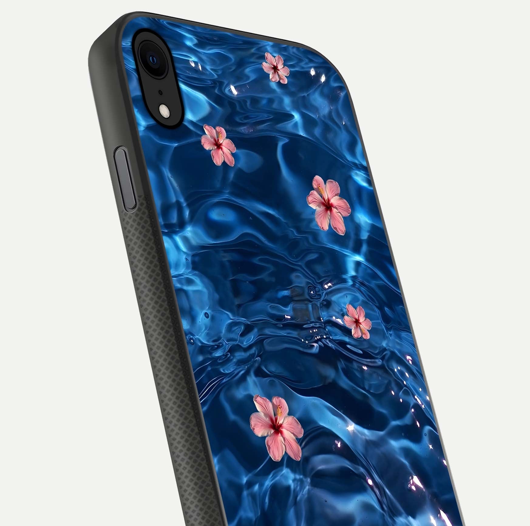 Blooming Water Drift Glass Case for iPhone X close-up angle showing petal details, soft aqua tones, and smooth gloss reflection