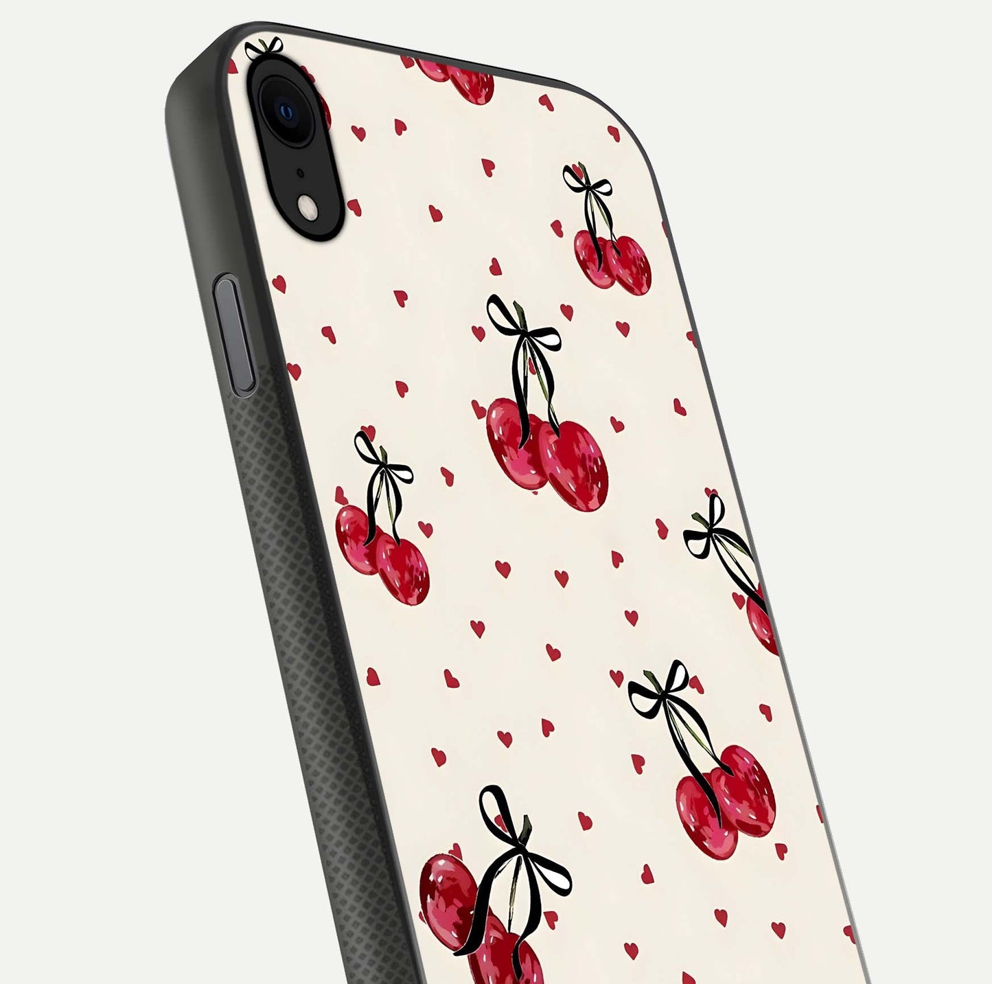 Cherry Heart Bow Glass Case for iPhone X close-up highlighting small bows, cherry red tones, and gloss shine