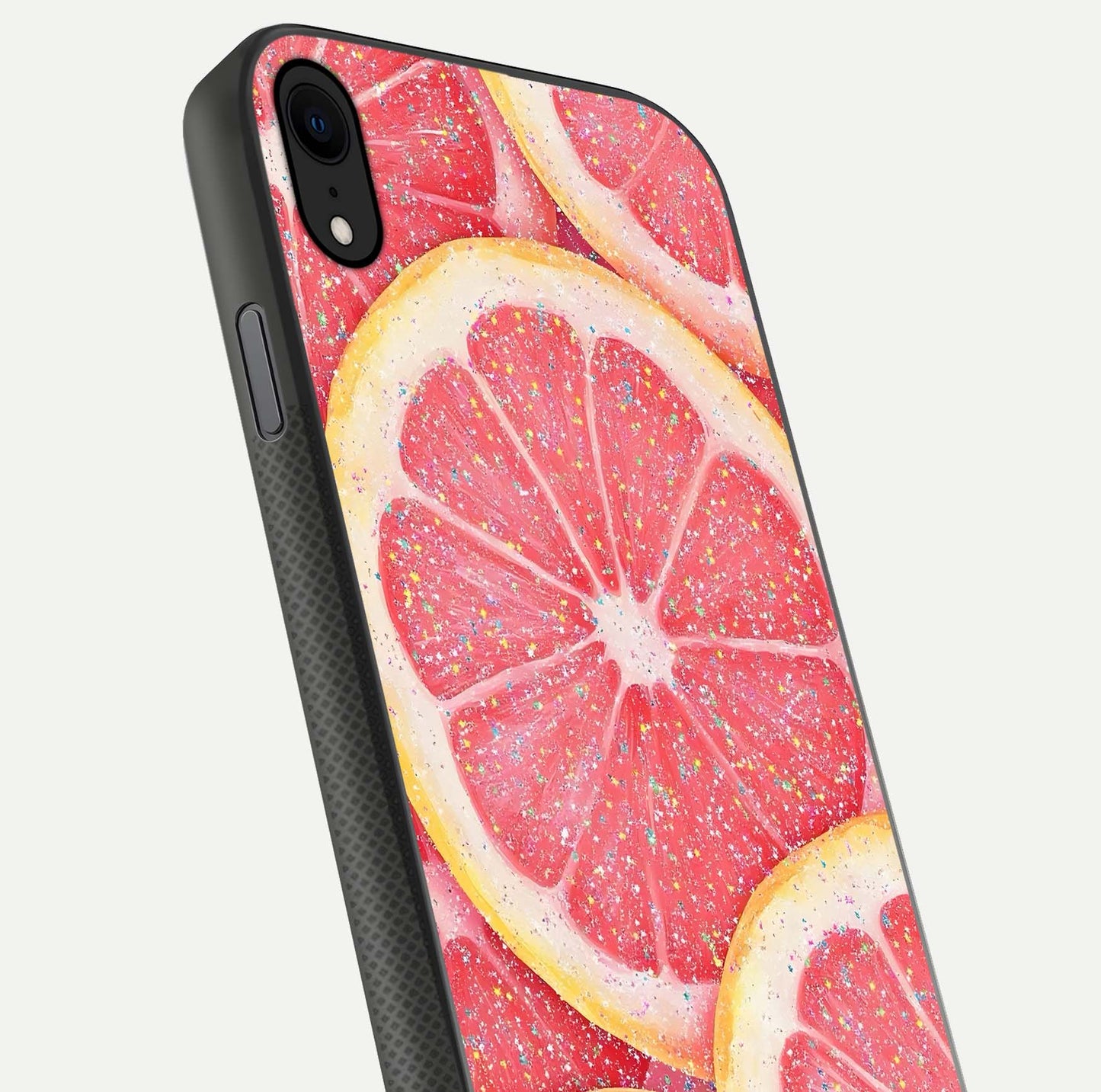 Glitter Grapefruit Glass Case for iPhone X close-up angled shot showing fruit texture and glitter reflection