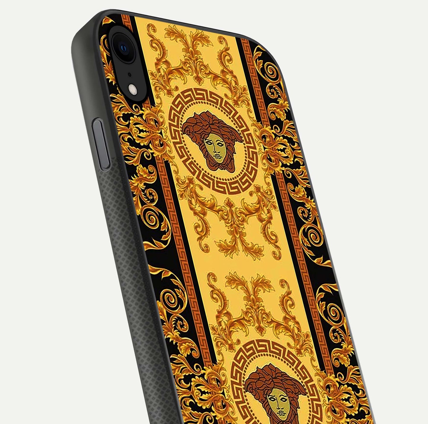 Golden Royal Heritage Glass Case for iPhone X close-up angled shot showing intricate design and metallic reflection