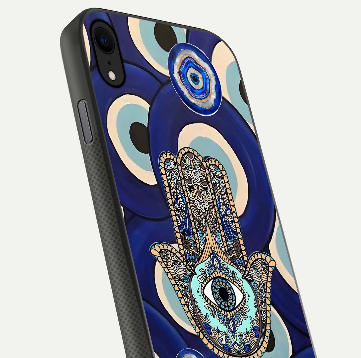 Hamsa Divine Guard Glass Case for iPhone X close-up angled shot showing detailed palm motif and reflection glow