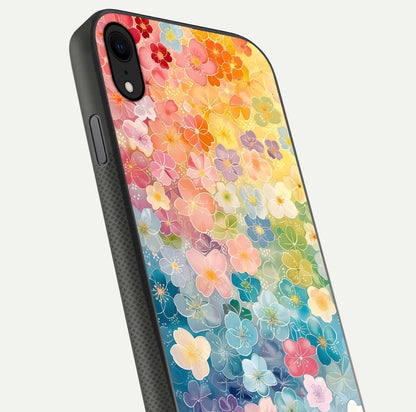 Rainbow Blossom Burst Glass Case for iPhone X close-up angled shot showing petal colors and reflection