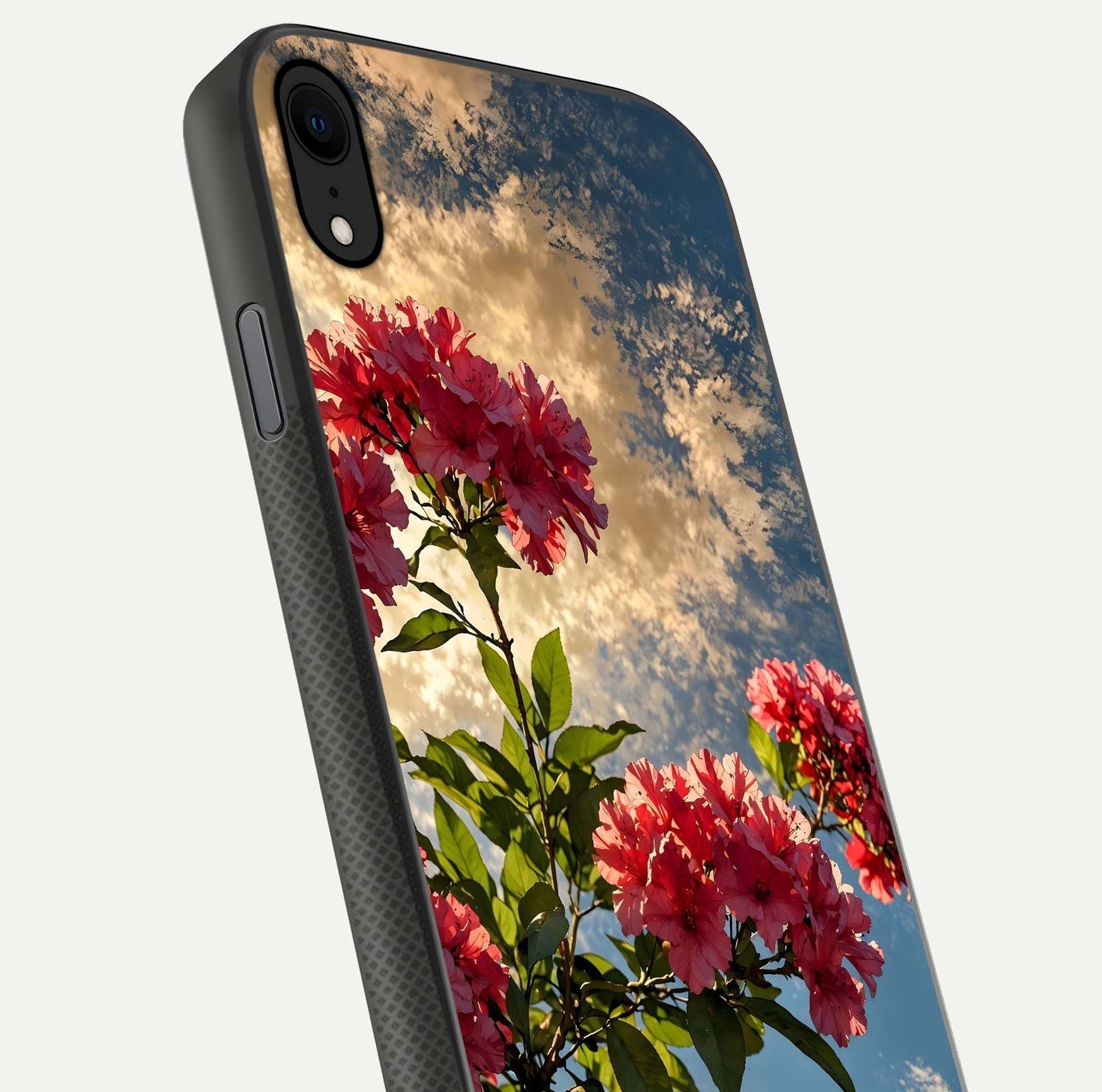 Red Bloom Skies Glass Case for iPhone X close-up angled shot highlighting detailed blooms and reflection