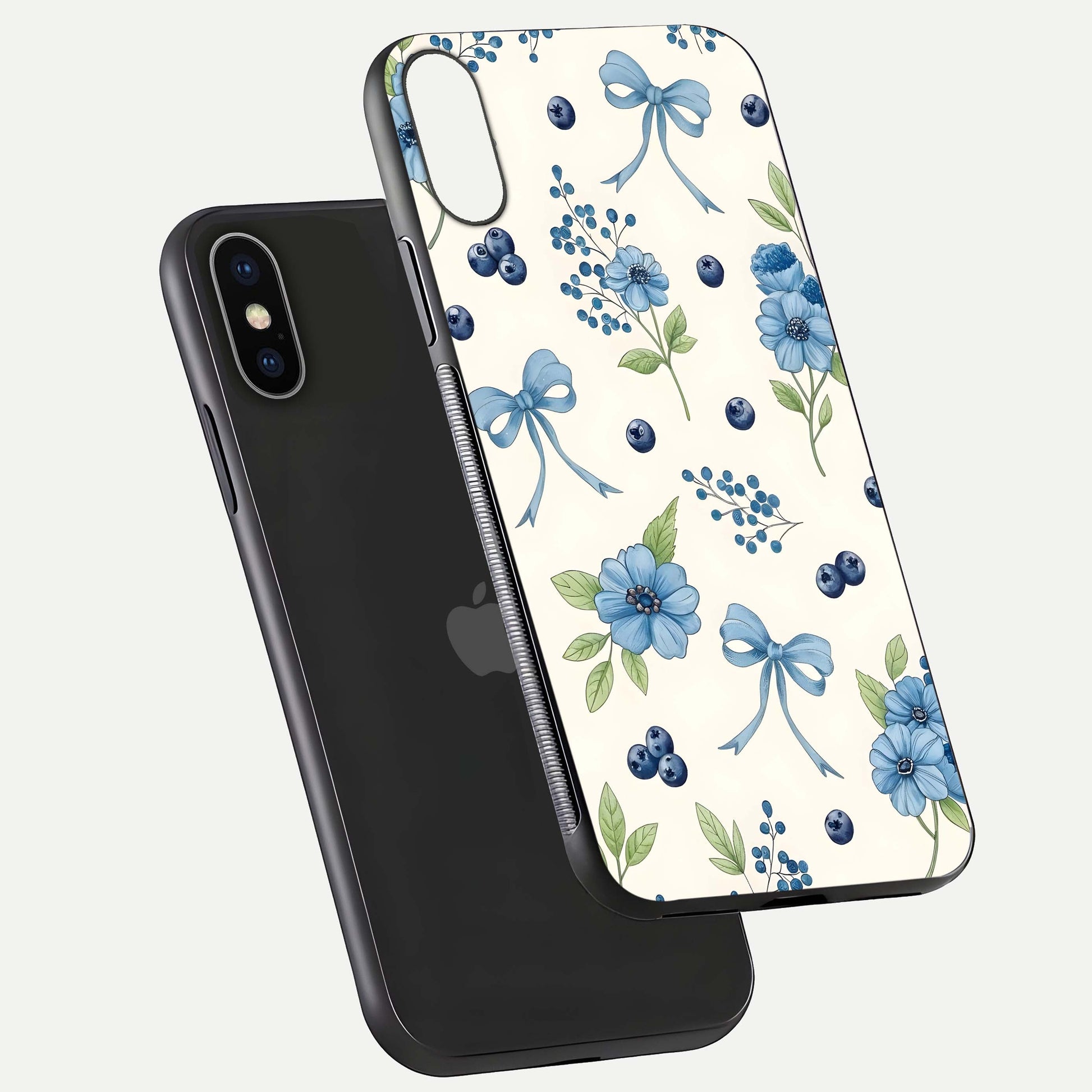 Blue Flower & Bow Glass Case for iPhone X floating mockup capturing gloss reflection and girly aesthetic