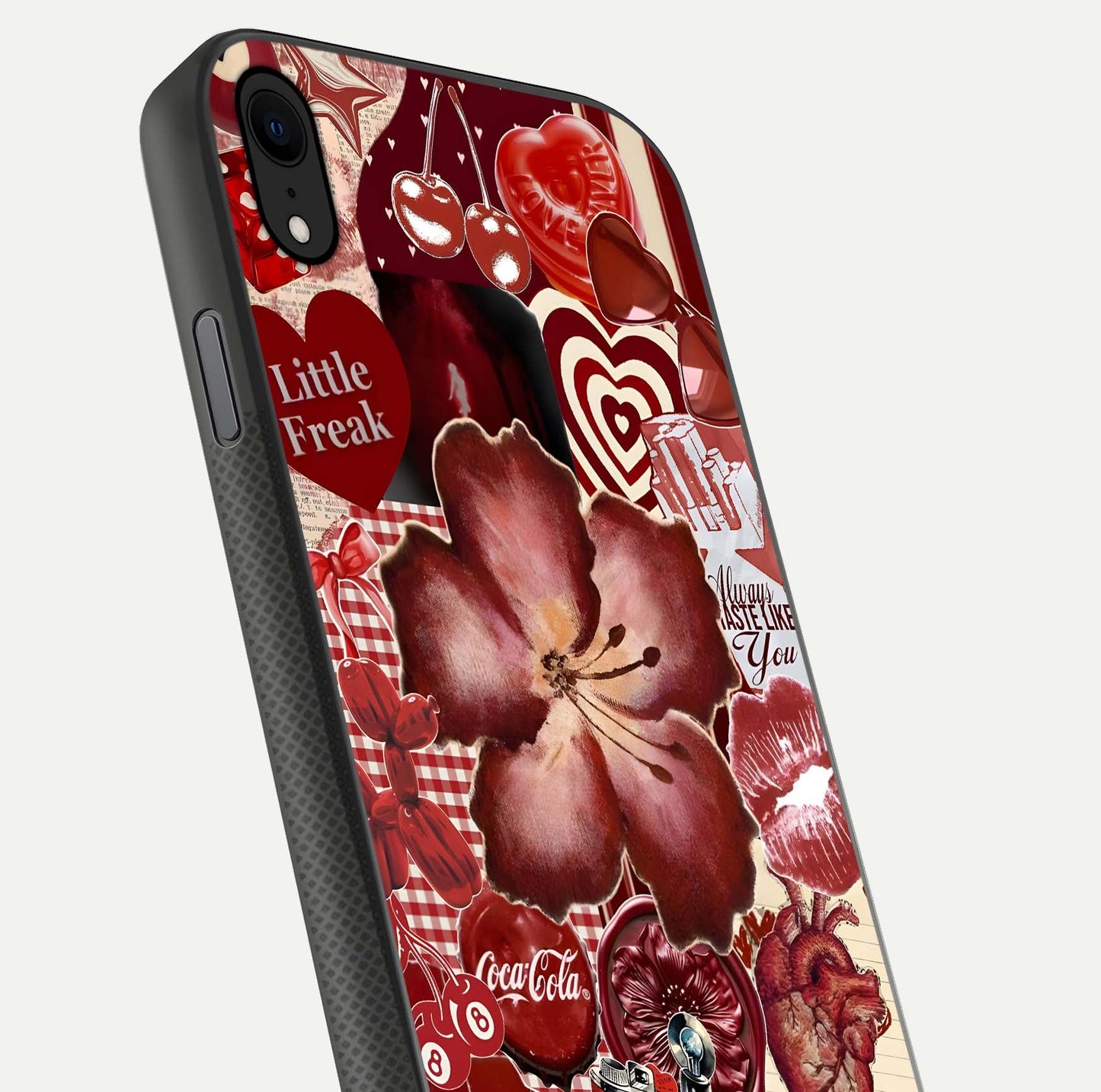 Aesthetic Little Freak Glass Case for iPhone 16 Pro close-up angled shot showing detailed artwork, bold design, and gloss reflection