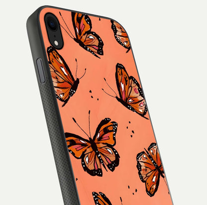 Coral Wing Butterfly Glass Case for iPhone Xr close-up highlighting wing pattern, coral tones, and reflection shine