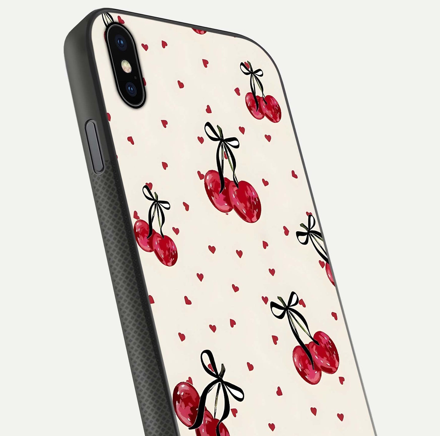 Cherry Heart Bow Glass Case for iPhone Xs close-up highlighting small bows, cherry red tones, and gloss shine