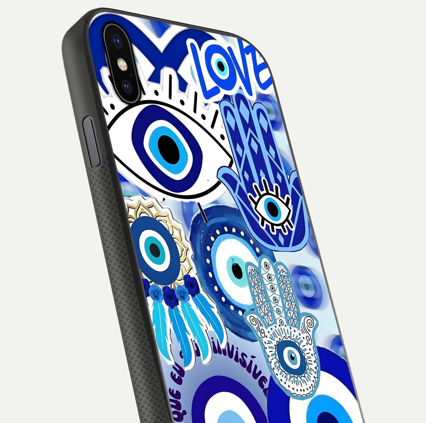 Evil Eyes Dream Glass Case for iPhone Xs close-up highlighting evil-eye charm detail and light reflection on glass