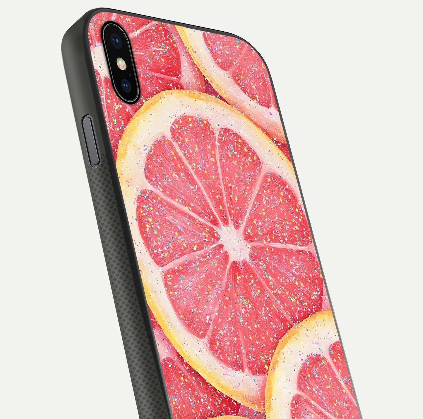 Glitter Grapefruit Glass Case for iPhone Xs close-up angled shot showing fruit texture and glitter reflection