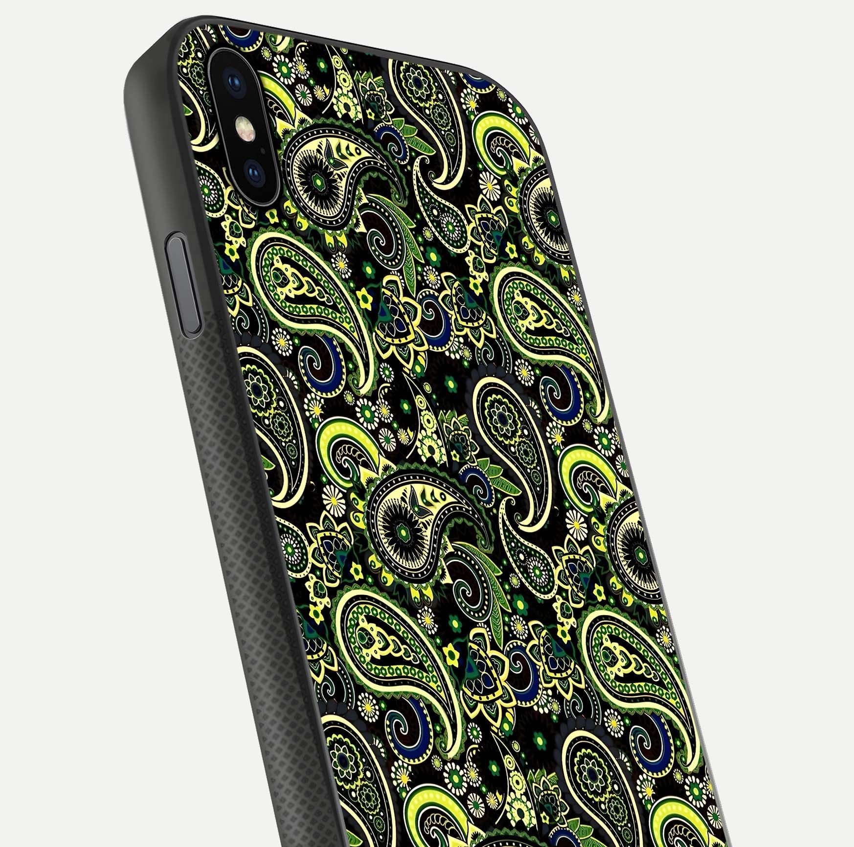 Green Mandala Pattern Glass Case for iPhone Xs close-up angled shot showing fine detailing and gold-green reflection