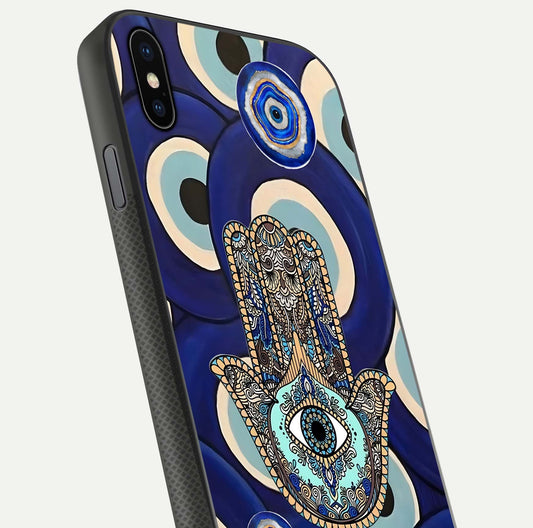 Hamsa Divine Guard Glass Case for iPhone Xs close-up angled shot showing detailed palm motif and reflection glow